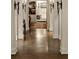 Hallway with arches, sconces, high ceilings and refinished concrete floors at 675 W Paces Ferry Nw Rd # 11, Atlanta, GA 30327