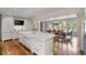 Open kitchen features marble countertops, stainless appliances, and adjacent dining area with chandelier at 675 W Paces Ferry Nw Rd # 11, Atlanta, GA 30327