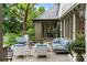 Inviting patio with outdoor seating, landscaping, and stone pavers at 675 W Paces Ferry Nw Rd # 11, Atlanta, GA 30327