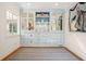 Charming sitting room featuring built-in shelving, decorative accents, and a large window at 675 W Paces Ferry Nw Rd # 11, Atlanta, GA 30327