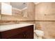 Updated bathroom featuring tile walls, a modern vanity, and a toilet at 7845 Chase Woods Dr, Jonesboro, GA 30236