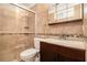 Modern bathroom with tiled shower, updated vanity, and sleek fixtures at 7845 Chase Woods Dr, Jonesboro, GA 30236