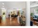 Open-concept living space with hardwood floors, abundant natural light, and seamless flow to the kitchen and dining area at 206 Flora Ne Ave, Atlanta, GA 30307