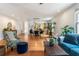 Expansive living space with hardwood floors, stylish furnishings, and a seamless transition to the kitchen at 206 Flora Ne Ave, Atlanta, GA 30307