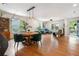 Spacious living area with hardwood floors, a dining area, and plenty of natural light at 206 Flora Ne Ave, Atlanta, GA 30307