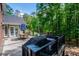 Enjoy outdoor dining on this composite deck, complete with grill and views of mature trees at 213 Shady Valley Dr, Carrollton, GA 30116