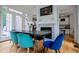 Open dining room area with hardwood flooring and access to views and other areas of the house at 213 Shady Valley Dr, Carrollton, GA 30116