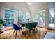 Sun-filled dining area with hardwood floors, views, and space to host or enjoy casual dining at 213 Shady Valley Dr, Carrollton, GA 30116