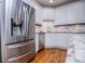 Stainless steel refrigerator complementing the modern kitchen's design and functionality at 213 Shady Valley Dr, Carrollton, GA 30116
