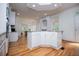 Modern kitchen featuring stainless steel appliances, white cabinets, and a central island at 213 Shady Valley Dr, Carrollton, GA 30116