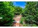 Stone steps through lush green landscaping at 213 Shady Valley Dr, Carrollton, GA 30116
