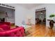 Open-concept living room features hardwood floors, and stylish decor at 213 Shady Valley Dr, Carrollton, GA 30116