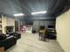Finished basement offers a versatile space with modern flooring, lighting and ample room for activities at 4080 Longford Ne Dr, Marietta, GA 30066