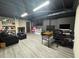 Finished basement offers a versatile space with modern flooring, lighting and ample room for activities at 4080 Longford Ne Dr, Marietta, GA 30066