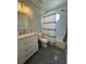 Bright bathroom featuring subway tile, modern vanity, and a stylish shower curtain at 4080 Longford Ne Dr, Marietta, GA 30066
