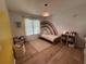 bedroom with hardwood floors, a cute bed, and unique rainbow wall art at 4080 Longford Ne Dr, Marietta, GA 30066