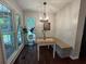 Cozy breakfast nook with bench seating, natural light, and charming decor at 4080 Longford Ne Dr, Marietta, GA 30066