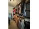 Walk-in closet with custom shelving, hanging rods, and organized clothing and storage solutions at 4080 Longford Ne Dr, Marietta, GA 30066