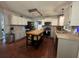 Spacious kitchen featuring light gray cabinets, black appliances, and a center island at 4080 Longford Ne Dr, Marietta, GA 30066