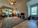 Spacious living room with vaulted ceilings, hardwood floors, and large windows at 4080 Longford Ne Dr, Marietta, GA 30066