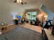 Home office featuring hardwood floors, vaulted ceilings, and large windows at 4080 Longford Ne Dr, Marietta, GA 30066