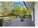 The back deck has outdoor seating, a grill, and a fire pit for enjoyment at 4166 Idlevale Dr, Tucker, GA 30084