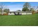 Large, flat backyard with a well-maintained lawn and a deck, perfect for outdoor entertaining at 4166 Idlevale Dr, Tucker, GA 30084