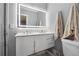 Modern bathroom with double sink vanity, LED mirror, and contemporary fixtures at 4166 Idlevale Dr, Tucker, GA 30084