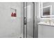 Updated walk-in shower with rainfall shower head and glass door at 4166 Idlevale Dr, Tucker, GA 30084