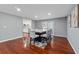 Elegant dining room featuring hardwood floors, recessed lighting, and easy access to the kitchen at 4166 Idlevale Dr, Tucker, GA 30084