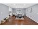 Elegant dining room featuring hardwood floors and a modern table with seating at 4166 Idlevale Dr, Tucker, GA 30084