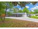 Side view of renovated single-story house with covered parking, offering practicality and enhanced curb appeal at 4166 Idlevale Dr, Tucker, GA 30084