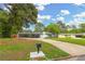 Charming single-story home with a well-maintained lawn and long driveway at 4166 Idlevale Dr, Tucker, GA 30084