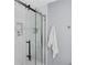 Close-up of a modern shower with a glass enclosure and sleek black hardware at 4166 Idlevale Dr, Tucker, GA 30084