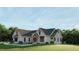 Charming home exterior with a manicured lawn and professionally landscaped front yard at 2468 Rockbridge Nw Rd, Conyers, GA 30012
