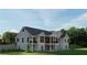 Back view of the stylish home featuring two stories, well manicured lawn, and multiple balconies at 2468 Rockbridge Nw Rd, Conyers, GA 30012