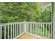 Private balcony surrounded by lush greenery offers peaceful outdoor space at 2748 Suwanee Se Way, Marietta, GA 30067