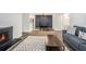 Living room showcases fireplace, modern flooring, and an adjacent dining area at 2748 Suwanee Se Way, Marietta, GA 30067