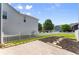 Backyard featuring a patio and landscaped garden area at 3524 Old Towne Ln, Cumming, GA 30040