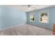 Spacious bedroom featuring plush carpeting and two windows allowing natural light at 3524 Old Towne Ln, Cumming, GA 30040