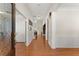 Welcoming entryway with hardwood floors, elegant wainscoting, and decorative front door at 3524 Old Towne Ln, Cumming, GA 30040