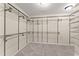 Spacious walk-in closet with adjustable wire shelving, offering customized storage solutions at 3524 Old Towne Ln, Cumming, GA 30040