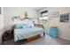 Cozy bedroom featuring a window and lots of decorative items and designs at 63 Brookstone E Park, Acworth, GA 30101