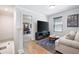 Cozy upstairs bonus room offers a relaxing space, including tv and table at 63 Brookstone E Park, Acworth, GA 30101