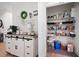 Home coffee bar with modern accents and storage, adjacent to walk-in pantry for supplies at 63 Brookstone E Park, Acworth, GA 30101