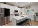 Stylish kitchen with a center island, stainless steel appliances, and white cabinetry at 63 Brookstone E Park, Acworth, GA 30101