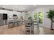 Bright eat-in kitchen with stainless steel appliances and access to the deck at 63 Brookstone E Park, Acworth, GA 30101