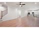 Open living area with hardwood floors connecting to the kitchen and staircase at 63 Brookstone E Park, Acworth, GA 30101