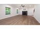Inviting living room features hardwood floors, fireplace and natural light from two windows at 63 Brookstone E Park, Acworth, GA 30101