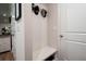 Mudroom area features built in bench and storage space, next to white doors at 63 Brookstone E Park, Acworth, GA 30101